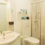 Apartment 1, © Ines Nejedly Modern bathroom with shower, washbasin and toilet.