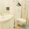 Apartment 1, © Ines Nejedly Modern bathroom with shower, washbasin and toilet.