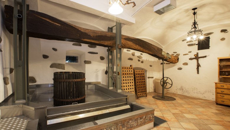 Wine cellar with press at the Kellermandl organic winery, &copy; Monika Loeff